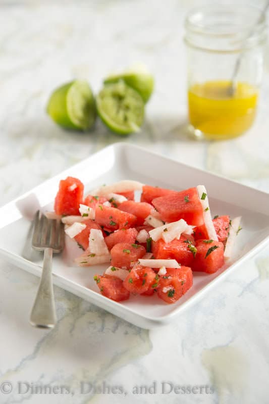 Jicima and Watermelon Salad - use juicy watermelon and slightly sweet jicima to make a great summer side dish. Toss with a honey-lime vinaigrette.
