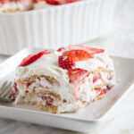 close up strawberry ice box cake on a plate