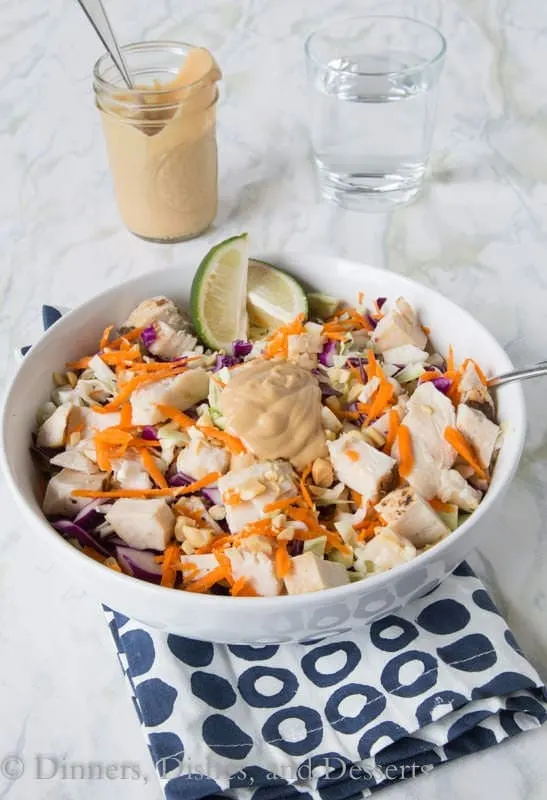Thai Chicken Salad - turn up your salad game with a Thai style chopped salad. Topped with chicken, veggies, and a peanut dressing make for a filling salad.
