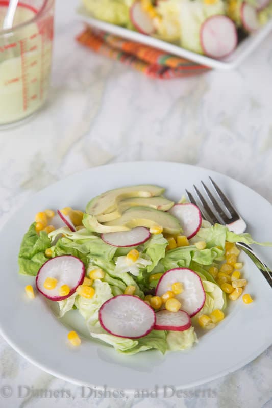 Corn and Radish Salad - An easy radish and corn salad topped with an avocado dressing. Great use of summer produce!
