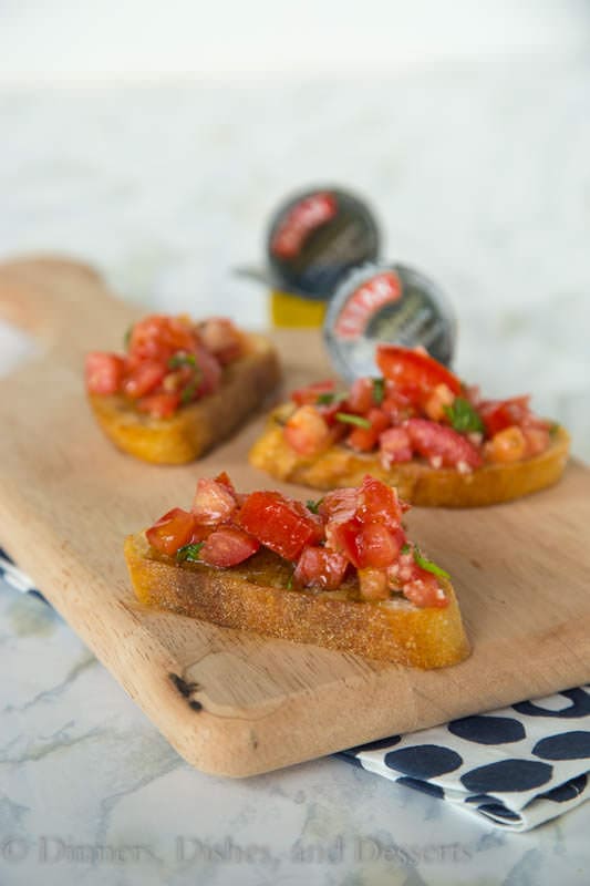 Easy Balsamic Bruschetta - Fresh summer tomatoes make the best bruschetta! Top with single serve balsamic vinaigrette packets, and you can have bruschetta for 1 or many, any night of the week!