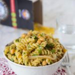 Middle Eastern Pasta Salad - put a spin on your traditional pasta salad with a chutney lime vinaigrette, chickpeas, cumin and sauteed onions. It is great served hot or cold!