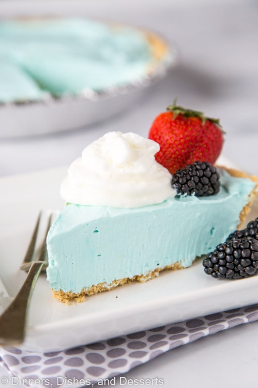 No Bake Kool Aid Pie is just 3 ingredients. Pictured on white plate, zoomed in