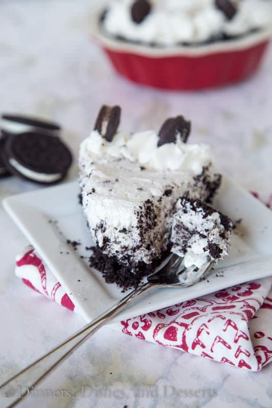 oreo cheesecake with bite on a fork