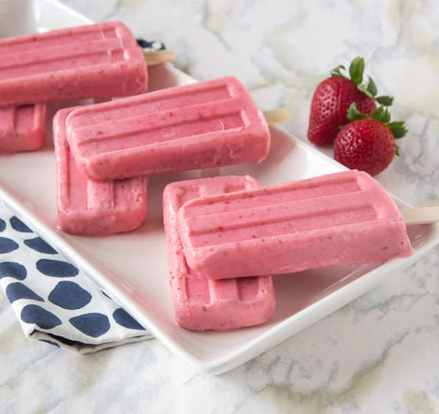 strawberry greek yogurt popsicles on a plate