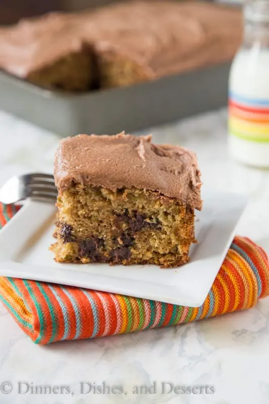 zucchini chocolate chip cake with nutella buttercream frosting on a plate