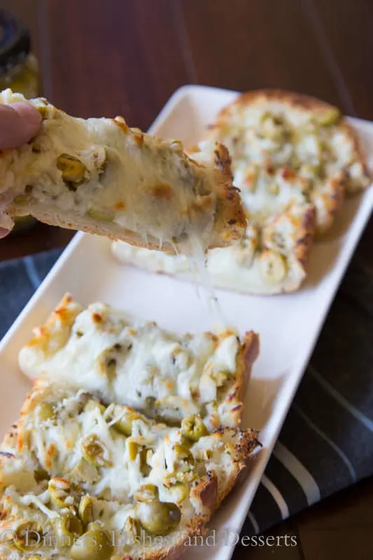 garlic olive cheese bread on a plate