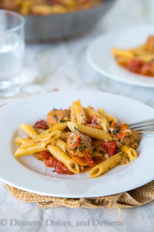 One Pot Pasta with Sausage and Tomatoes - a quick and easy one pot pasta. Everything is cooked in one pot, and dinner is on the table in 20 minutes!