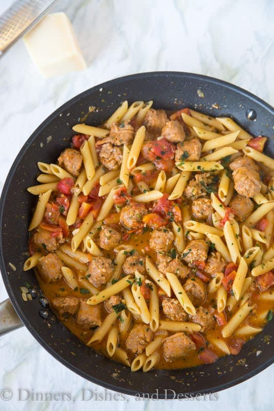 One Pot Pasta with Sausage and Tomatoes - a quick and easy one pot pasta. Everything is cooked in one pot, and dinner is on the table in 20 minutes!