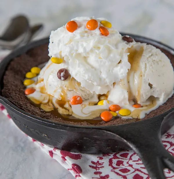 Skillet Brownie for Two - a rich and fudgy brownie baked in a skillet, topped with ice cream and perfect for two!
