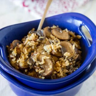 Mushroom Rice Pilaf - an easy homemade rice pilaf with lots of fresh mushrooms! Great side dish recipe for chicken, fish, pork, or beef.