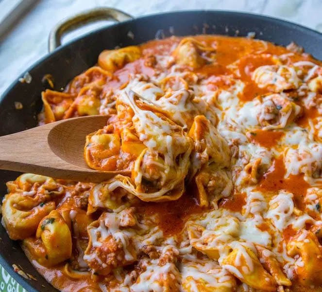 Sausage Tortellini Skillet - Your favorite tortellini comes together in a quick and easy one pan meal the whole family will love!