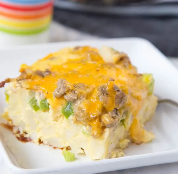 Make Ahead Potato and Sausage Egg Bake - a super easy make ahead egg bake made with hash browns, sausage, green peppers, and lots of cheese! Perfect for brunch or when you have a house full of people!