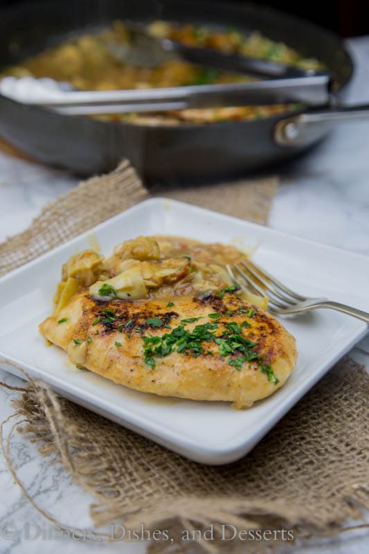 Chicken in Artichoke Pan Sauce - sauteed chicken breasts in a creamy artichoke pan sauce. Ready in minutes and perfect for weeknights!