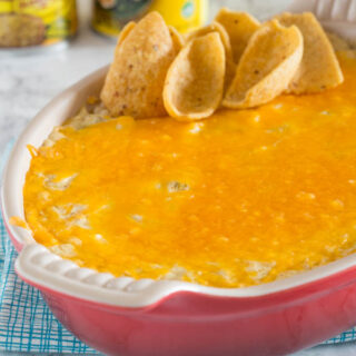 Green Chili Enchilada Dip - Get ready for game day with a creamy, cheesy, green chili enchilada dip recipe!