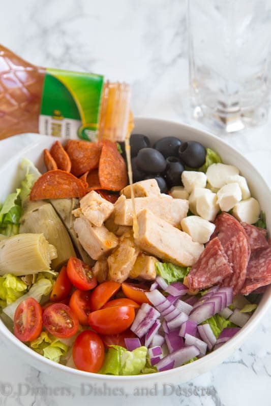 grilled chicken antipasto salad in a bowl