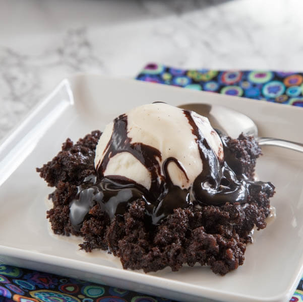 Hot Fudge Crock Pot Brownies - Rich and fudgy brownies made in the crock pot. So easy and sure to fix any chocolate craving!