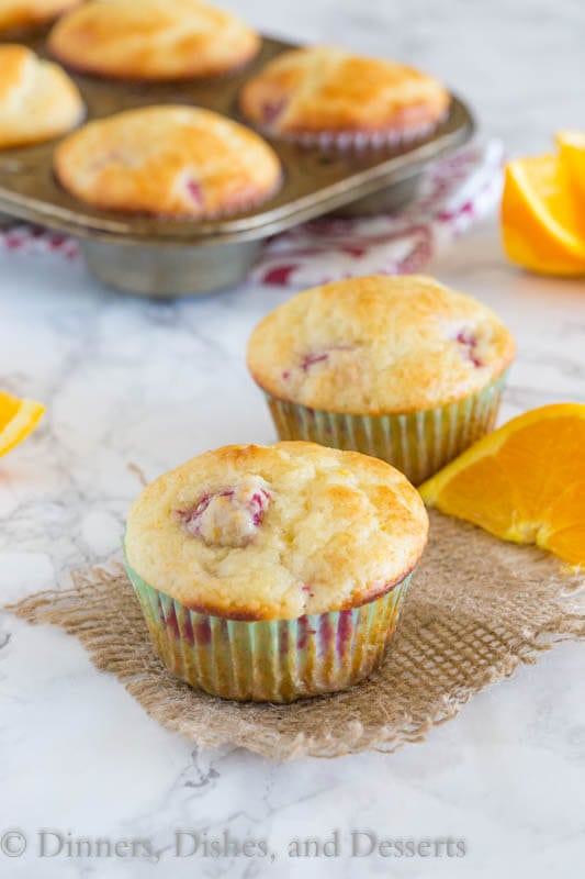 Tangerine Raspberry Muffins - Light and fluffy muffins with lots of fresh juicy raspberries and bursts of tangerine. The perfect way to start the day.