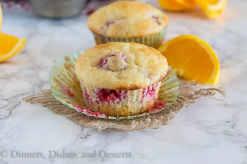 Tangerine Raspberry Muffins - Light and fluffy muffins with lots of fresh juicy raspberries and bursts of tangerine. The perfect way to start the day.