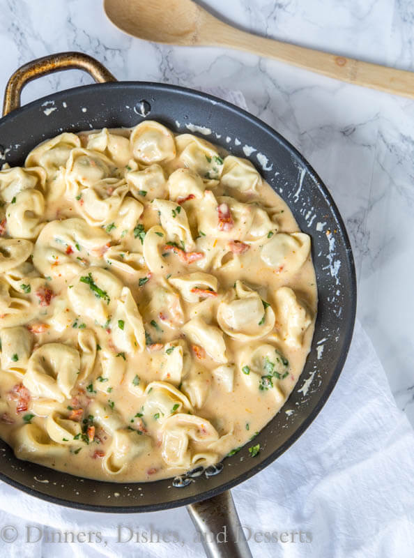 creamy tomato basil tortellini in a bowl