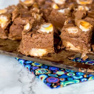 Creme Egg Fudge - the famous Cadbury Creme Eggs get mixed in with a rich and chocolate-y fudge to make it perfect for Easter.