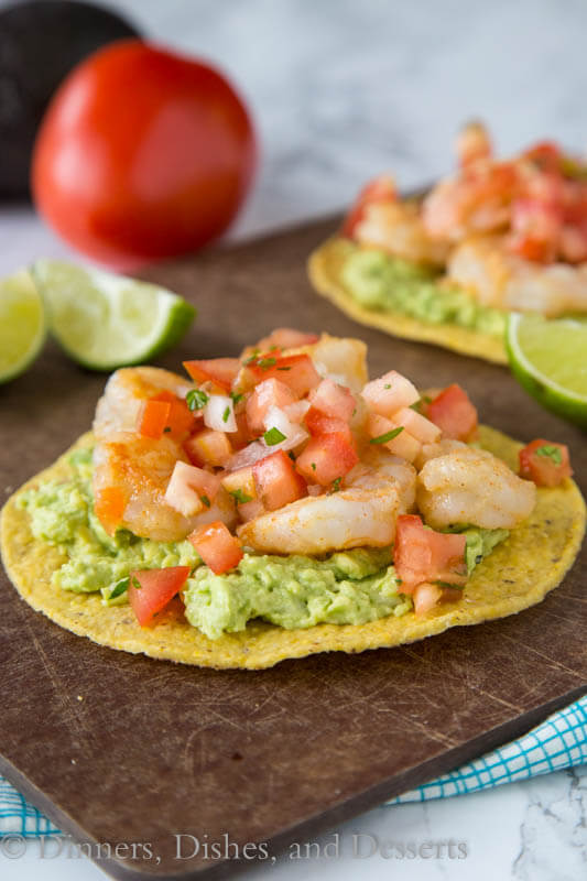 Shrimp & Avocado Tostadas - a fun and easy way to get Mexican food on weeknights, in minutes! Crispy tostadas topped with guacamole, spiced shrimp, and your favorite salsa.