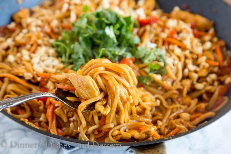 spicy thai noodles with chicken in a pan