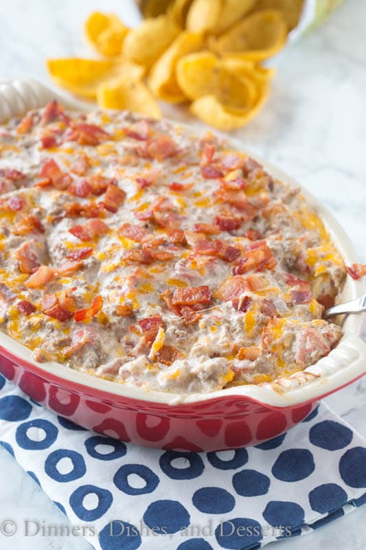 Bacon Cheeseburger Dip - all the flavor of your favorite bacon cheeseburger in an ooey, gooey, cheesy, dip. Great for game day, entertaining or just because!