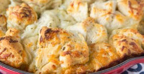 Italian Cheese Pull Apart Bread - make this easy side dish any night of the week. Open a can of biscuits, toss with butter, seasonings, cheese and bake!