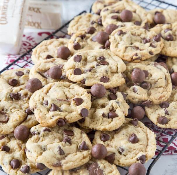 Malt Chocolate Chip Whopper Cookies - chewy chocolate chip cookies with a fun twist! Mix in malt powder and whoppers to make them just a little more fun!