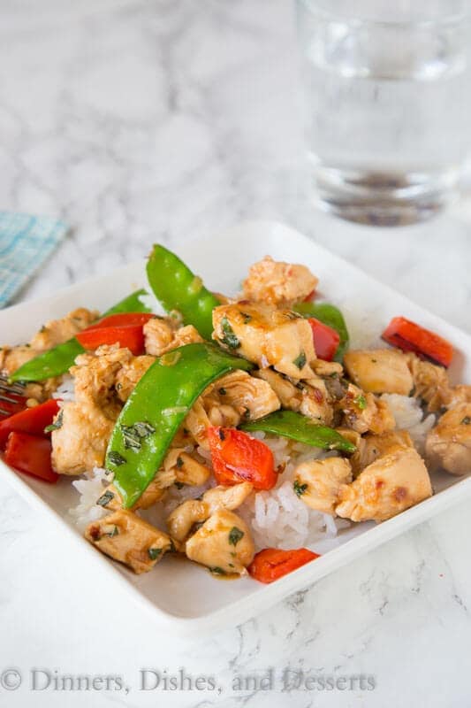 Spicy Basil Chicken - get dinner on the table in just minutes with the super easy chicken recipe. Great Asian flavors with just a little kick. Add veggies to make it a complete meal!