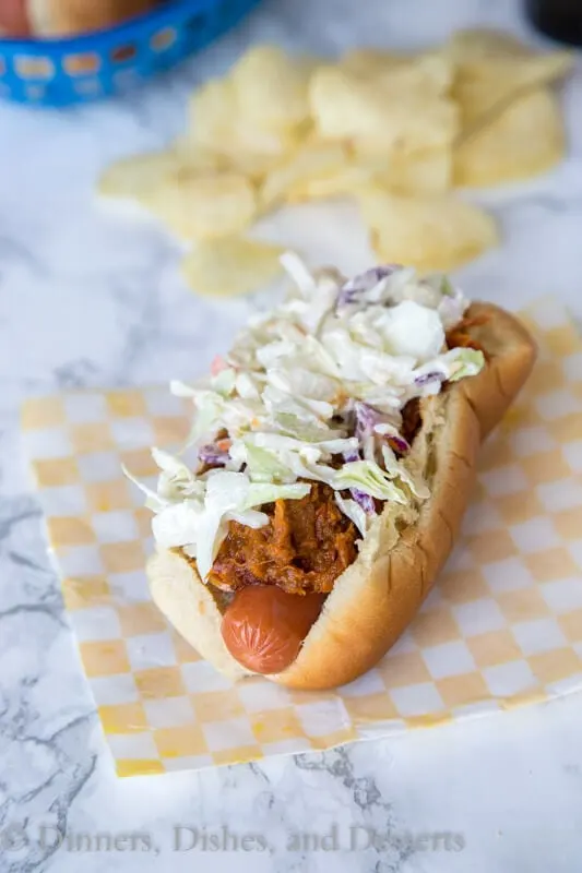 Barbecue Pulled Pork Hot Dogs are a fun way to take your grilled hot dogs up a notch. Everyone will be asking for them all summer long!