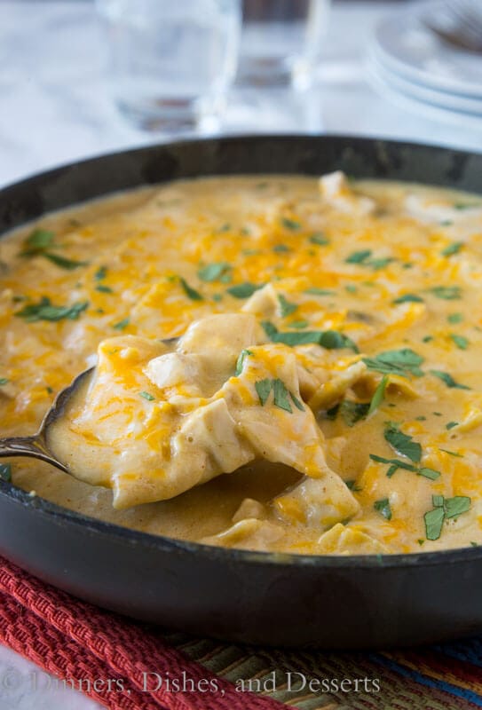 white chicken enchilada skillet in the pan