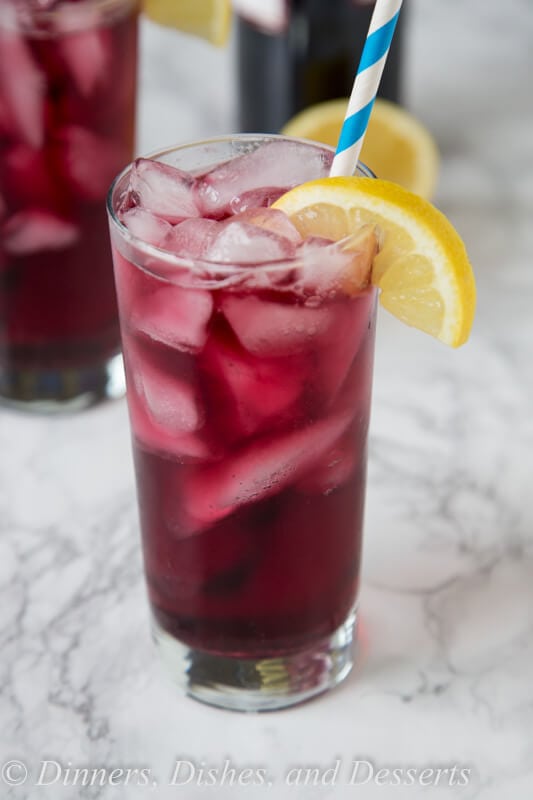 Red Wine Spritzer - a cool and refreshing cocktail you can enjoy anytime of day! So easy, you can make in minutes, with just 2 ingredients!