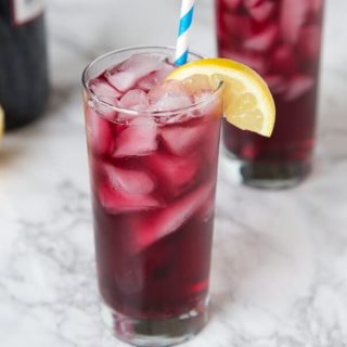 Red Wine Spritzer - a cool and refreshing cocktail you can enjoy anytime of day! So easy, you can make in minutes, with just 2 ingredients!