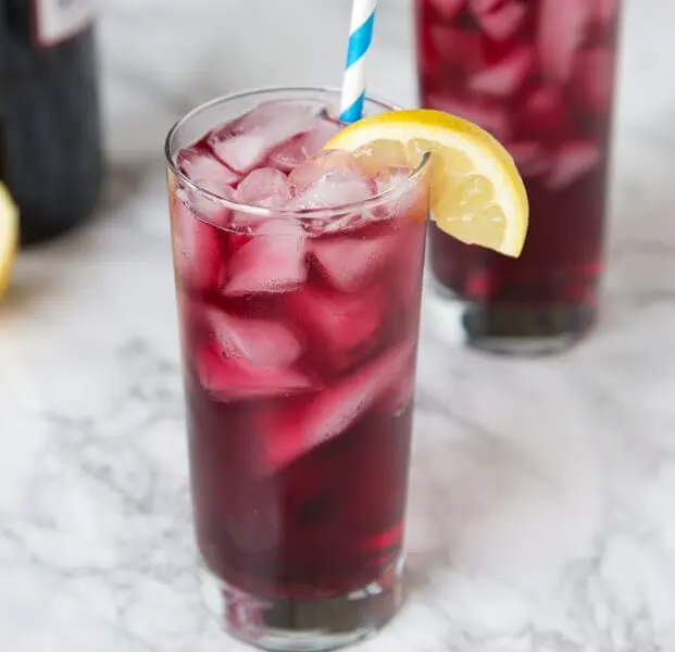 Red Wine Spritzer - a cool and refreshing cocktail you can enjoy anytime of day! So easy, you can make in minutes, with just 2 ingredients!