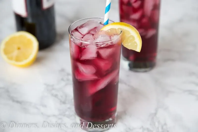 Wine Spritzer - use red win to make a cool and refreshing cocktail you can enjoy anytime of day! So easy, you can make in minutes, with just 2 ingredients!