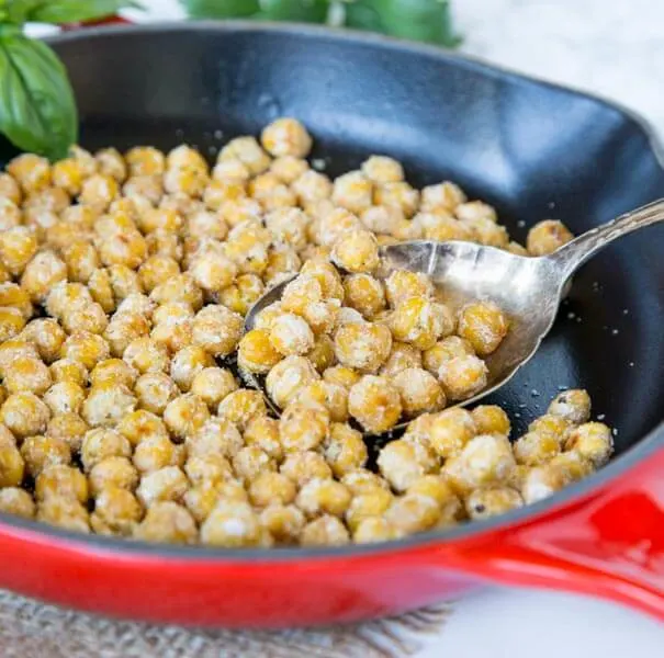 Parmesan Roasted Chickpeas - roasting chickpeas get them super crunchy. A great healthy snack or topping to a salad.