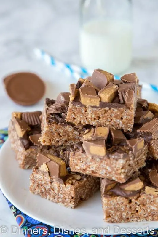Reese's Peanut Butter Rice Krispie Treats - An easy Rice Krispie treat made with Reese's peanut butter spread, topped with chocolate and peanut butter cups!