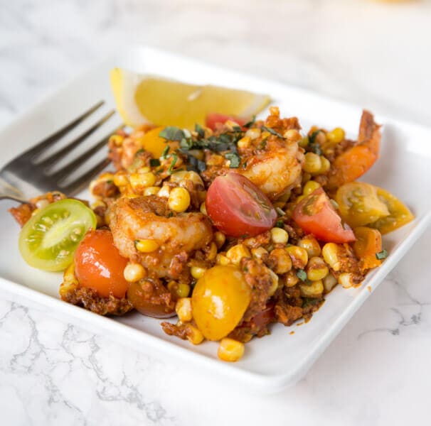 Shrimp, Chorizo, and Corn Salad - fresh corn and tomatoes make this salad bright and flavorful, and the chorizo adds just the right amount of heat.
