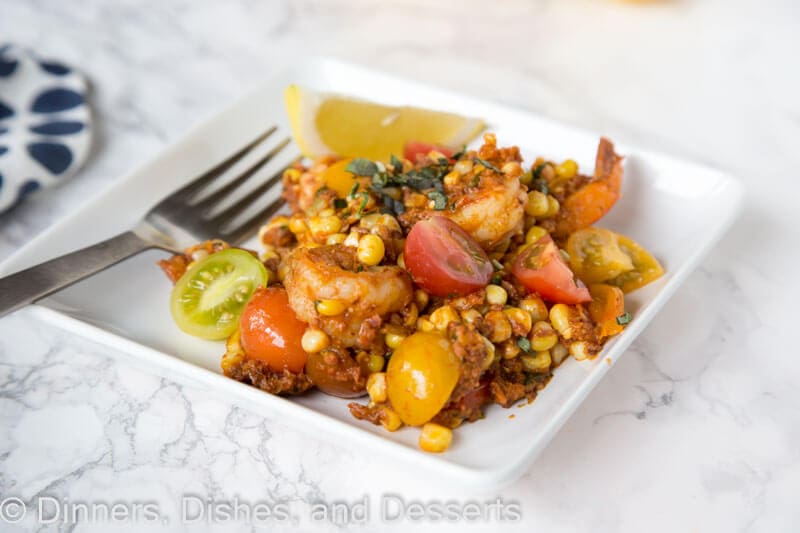 shrimp chorizo and  corn salad on a plate