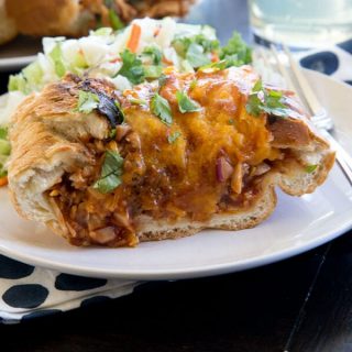 barbecue chicken stuffed french bread on a plate