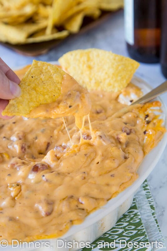 Cheddar Brat Cheese Dip - a warm, gooey cheese dip made with cheddar brats for so much extra flavor! Game day just got better!