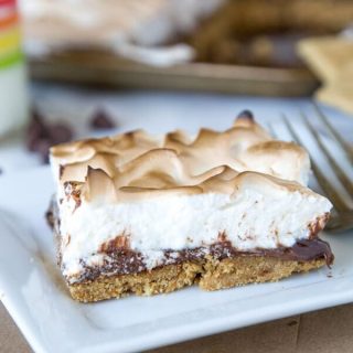 Sheet Pan S'mores Tart - S'mores aren't just for around the campfire, check out this tart with a light marshmallow meringue type topping!