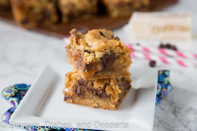chocolate chip caramel cookie bars on a plate