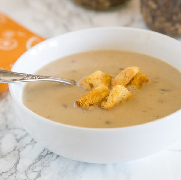 Creamy Mushroom Soup - a steaming, comforting bowl of homemade mushroom soup. Plus you can can (or freeze) the base for a quick batch of soup any day of the week!