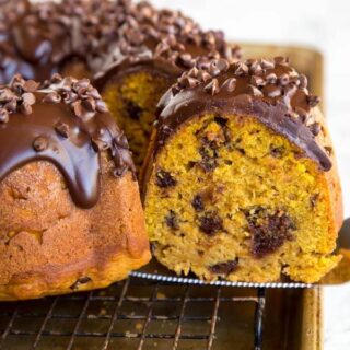 Pumpkin Chocolate Chip Cake - moist pumpkin cake with lots of chocolate chips and topped with a rich chocolate ganache.
