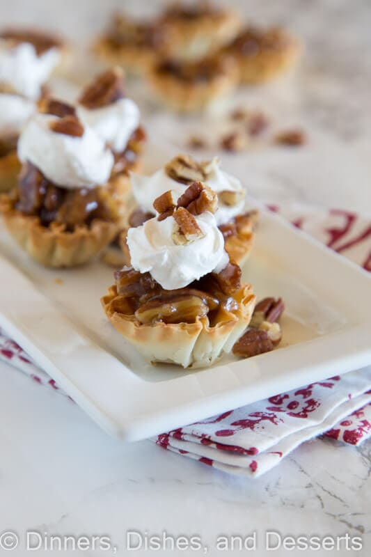 Mini Pecan Pie Bites - mini desserts are always more fun! Pecan Pie made into bite sized pieces, perfect for just that little something.