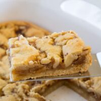 salted caramel crumble bars in a pan