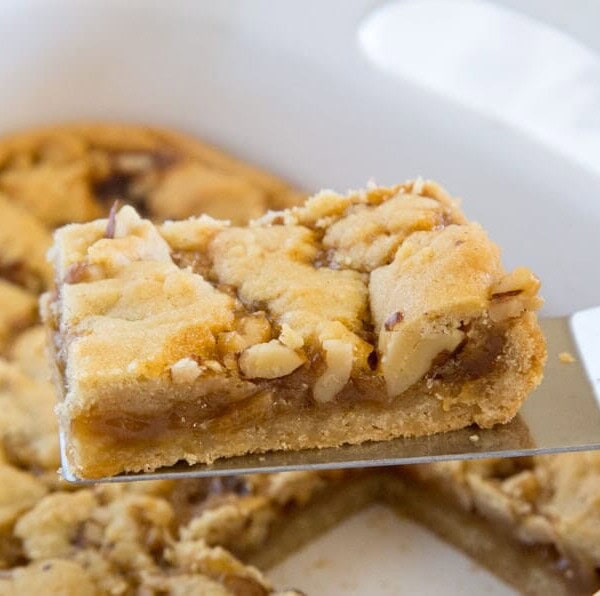 salted caramel crumble bars in a pan